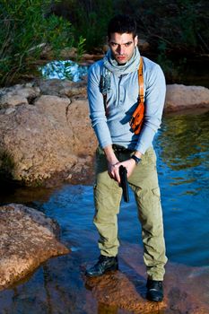 View of an treasure hunter, jungle adventurer type man.