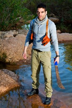 View of an treasure hunter, jungle adventurer type man.