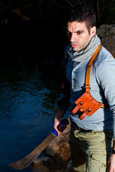 View of an treasure hunter, jungle adventurer type man.