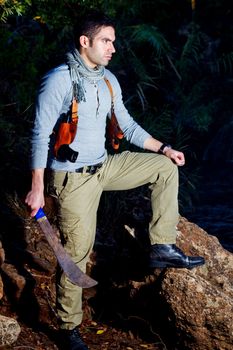 View of an treasure hunter, jungle adventurer type man.