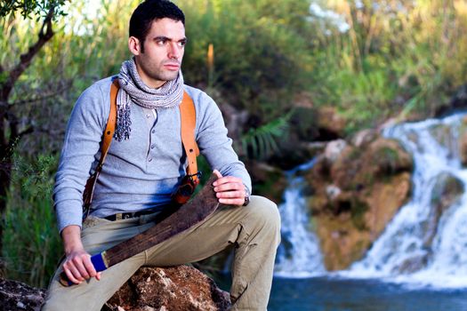 View of an treasure hunter, jungle adventurer type man.