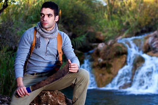 View of an treasure hunter, jungle adventurer type man.