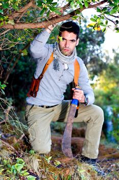 View of an treasure hunter, jungle adventurer type man.