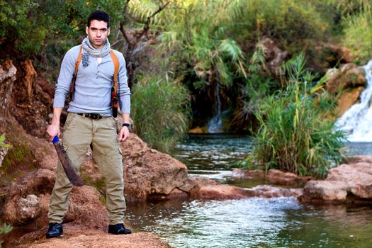 View of an treasure hunter, jungle adventurer type man.
