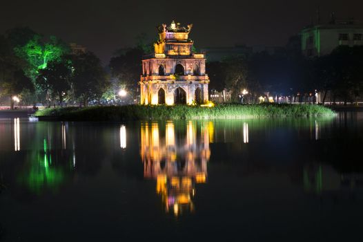 Turtle Tower at night on Hoan Kiem Lake. Hanoi, Vietnam. 