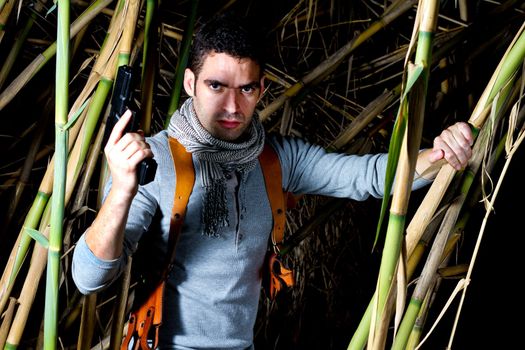 View of an treasure hunter, jungle adventurer type man.