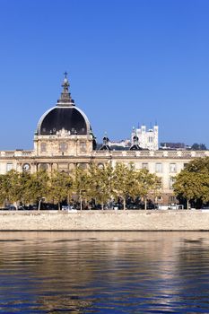 Hotel Dieu reflecting on the waters of Rhone River 