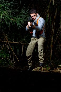 View of an treasure hunter, jungle adventurer type man.