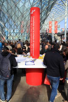 People at the entrance of Salone Internazionale del Mobile - International home furnishing and accessories exhibition