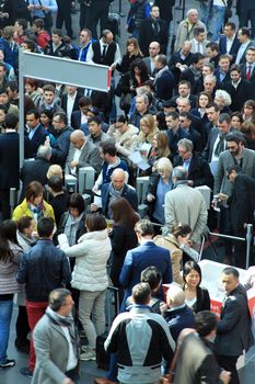 People enter Salone Internazionale del Mobile - International home furnishing and accessories exhibition