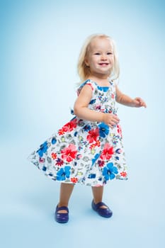 Well-dressed small girl isolated on white background