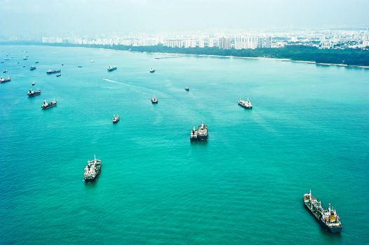 Many ships in Singapore harbor. Aerial view