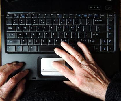 senior woman using laptop