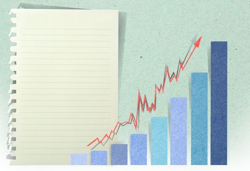 Conceptual Business charts with staple recycled paper craft stick