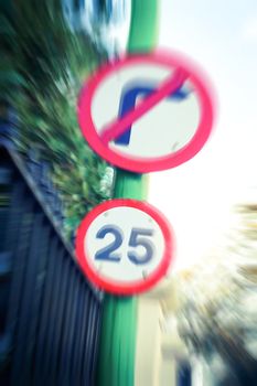 Speed sign with dra,atic zoom blue