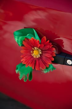 decorate red flower attached for door handle of car