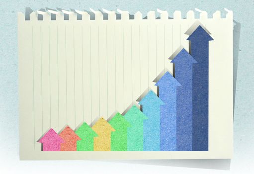Conceptual Business charts with staple recycled paper craft stick