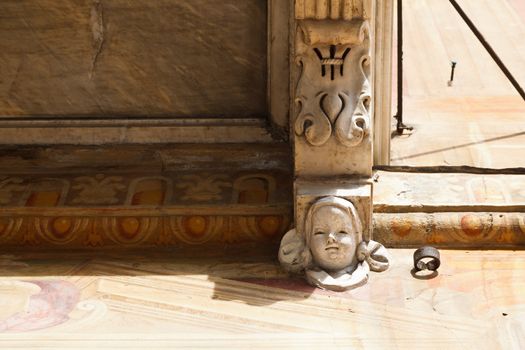 Marble Relief of Happy Face in Genoa, Italy