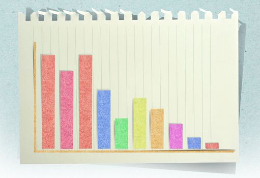 Conceptual Business charts with staple recycled paper craft stick