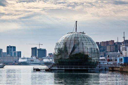 Glasshouse Over the Water and Genoa Port, Italy