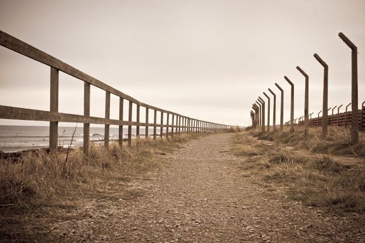 Disused path with old fence posts in Scotland