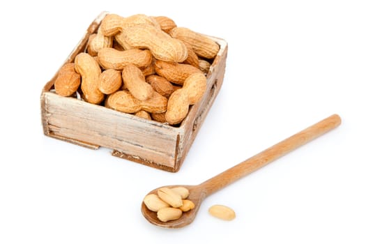 Peanuts in the old box, on white background