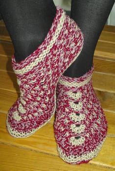 Hand knitted female slippers