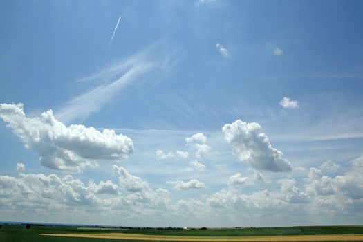 white clouds on blue sky