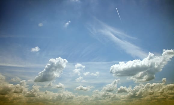 white clouds on blue sky