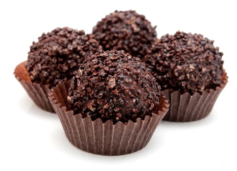 Delicious Chocolate Filled Pralines on White Background
