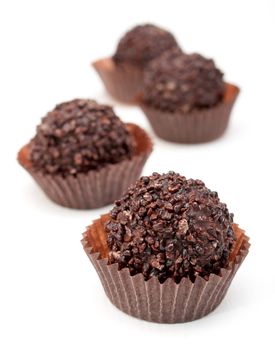 Delicious Chocolate Filled Pralines on White Background