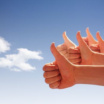 men's hands make thumbs up on blue sky