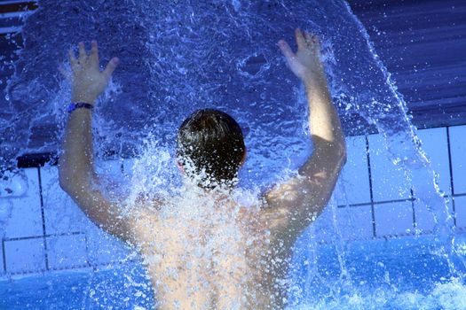 young attractive man relax in spa area