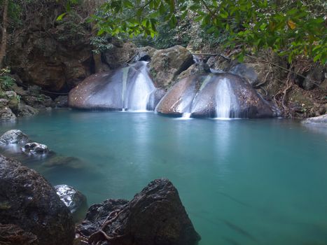 Emerald color water in tier fourth of Erawan waterfall, Erawan National Park, Kanchanaburi, Thailand