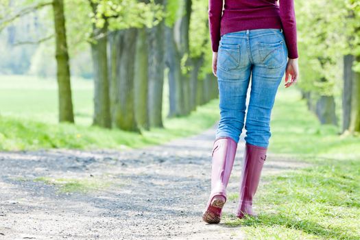 detail of woman wearing rubber boots