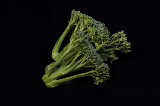 broccoli isolated on black background