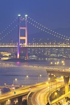 Tsing Ma Bridge in Hong Kong with highway background