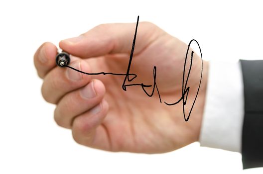 Detail of male hand writing signature on a glass board.  Over white background.