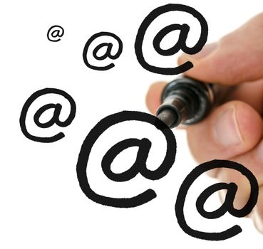 Close up of male hand writing multiple email symbols on a virtual white  board. 