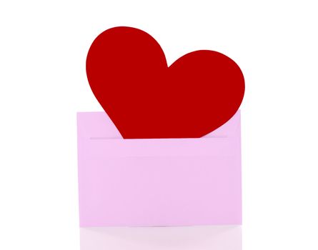 red heart in a pink enveloppe isolated on white