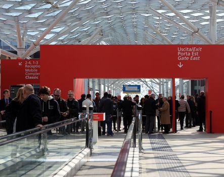 People enter Salone Internazionale del Mobile - International home furnishing and accessories exhibition