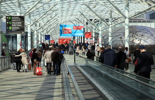 People enter Salone Internazionale del Mobile - International home furnishing and accessories exhibition