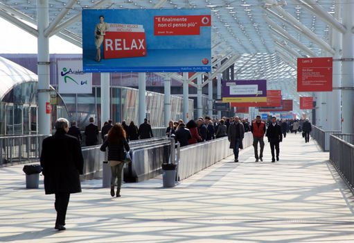 People enter Salone Internazionale del Mobile - International home furnishing and accessories exhibition