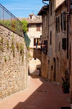 A small backstreet in an italian town in a sunny morning
