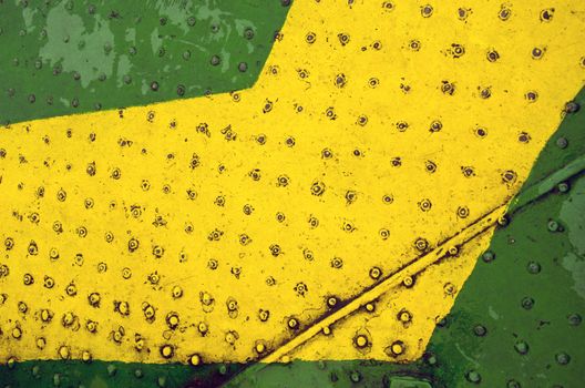 Painted metal floor background. Green yellow closeup backdrop of ferry passenger ship deck.
