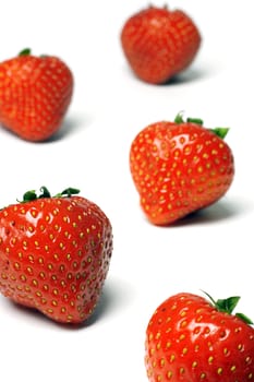 excellent brightly red strawberry on a white background