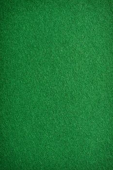 Green felt background. Useful for poker table or pool table surface