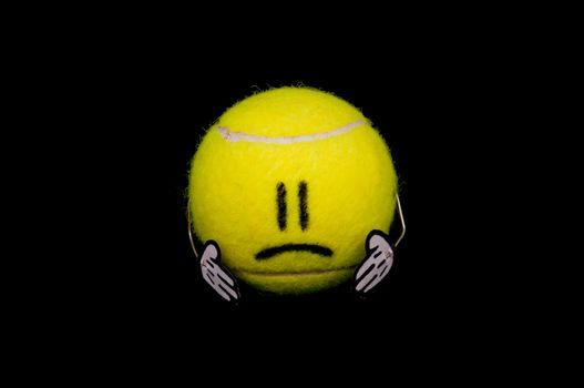 Cute yellow tennis ball is sad and unhappy