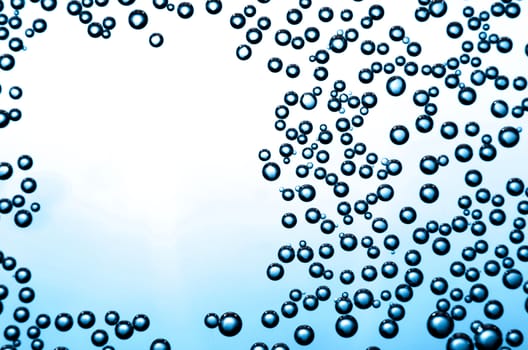 Gradient background with frame of bubbles on a glass.