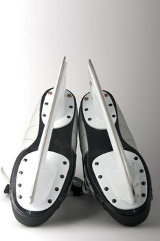 professional hockey skates on a white background